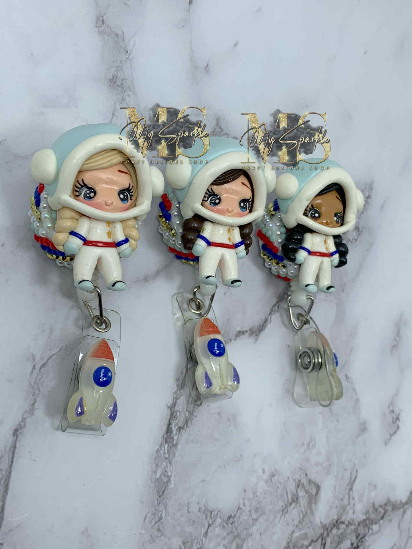 Astronaut Girl Clay Badge Reel