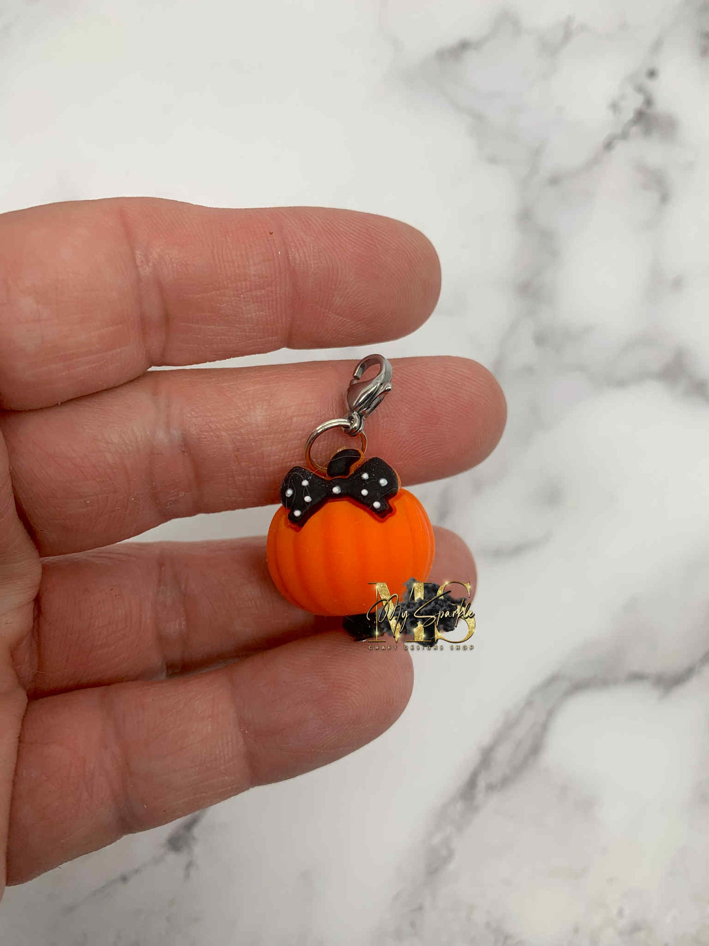 Pumpkin Badge Reel Charm