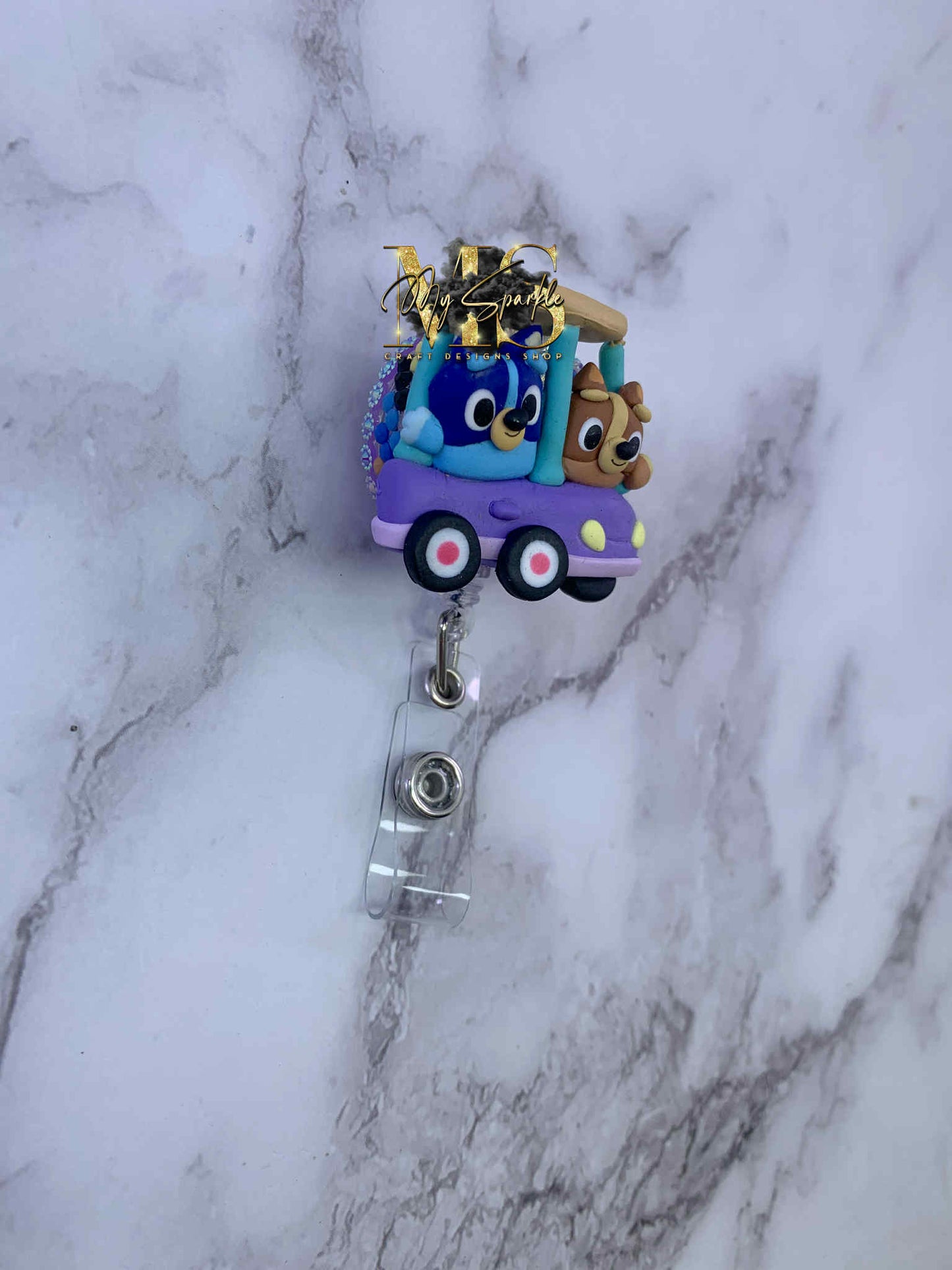 Blue Sister Dogs Clay Badge Reel