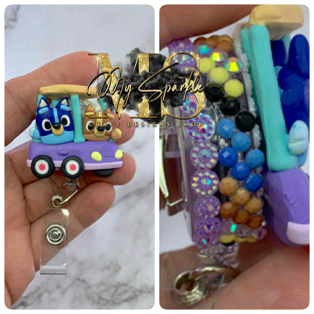 Blue Sister Dogs Clay Badge Reel