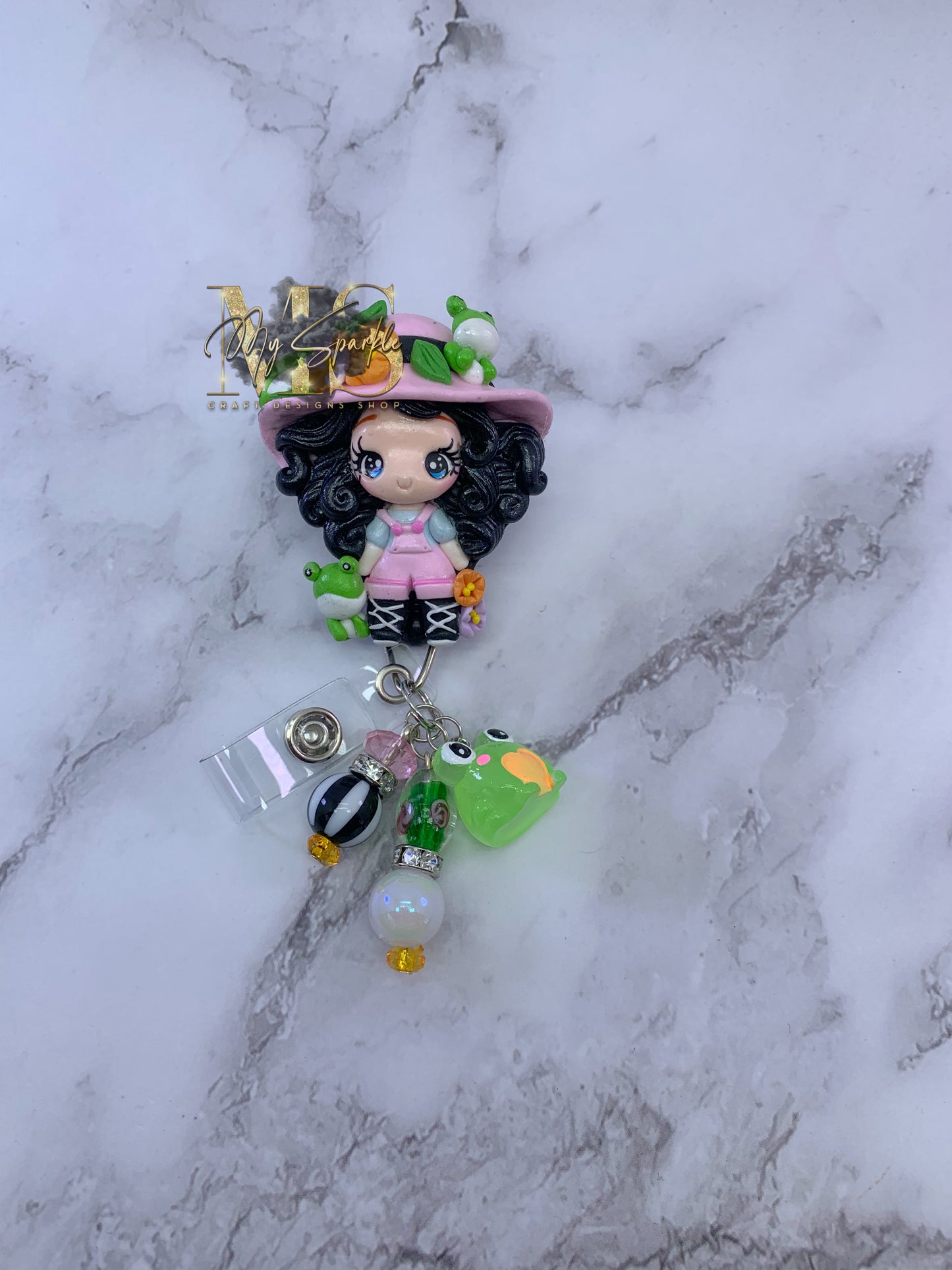 Cute Girl With Frogs Clay Badge Reel