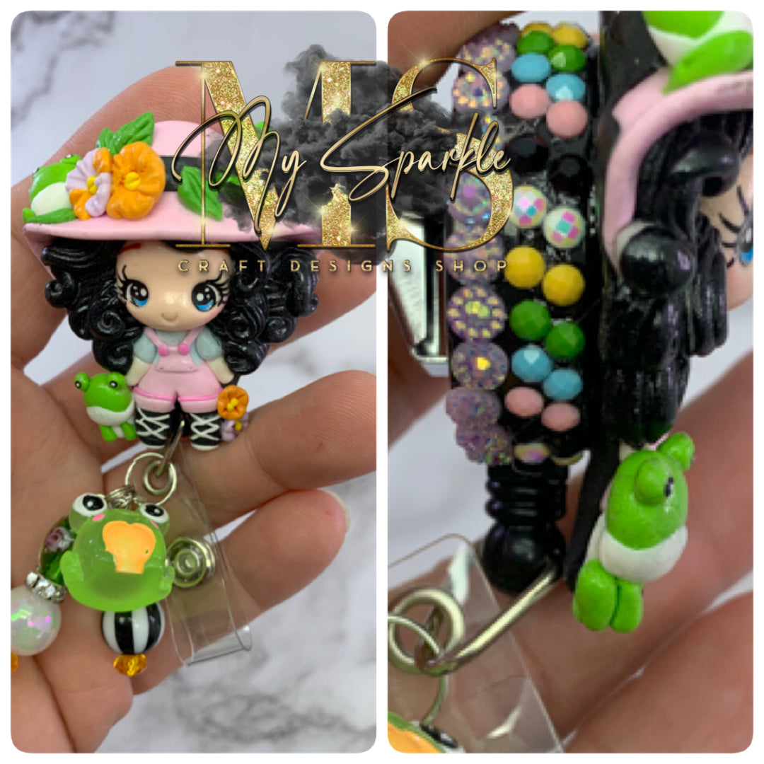 Cute Girl With Frogs Clay Badge Reel