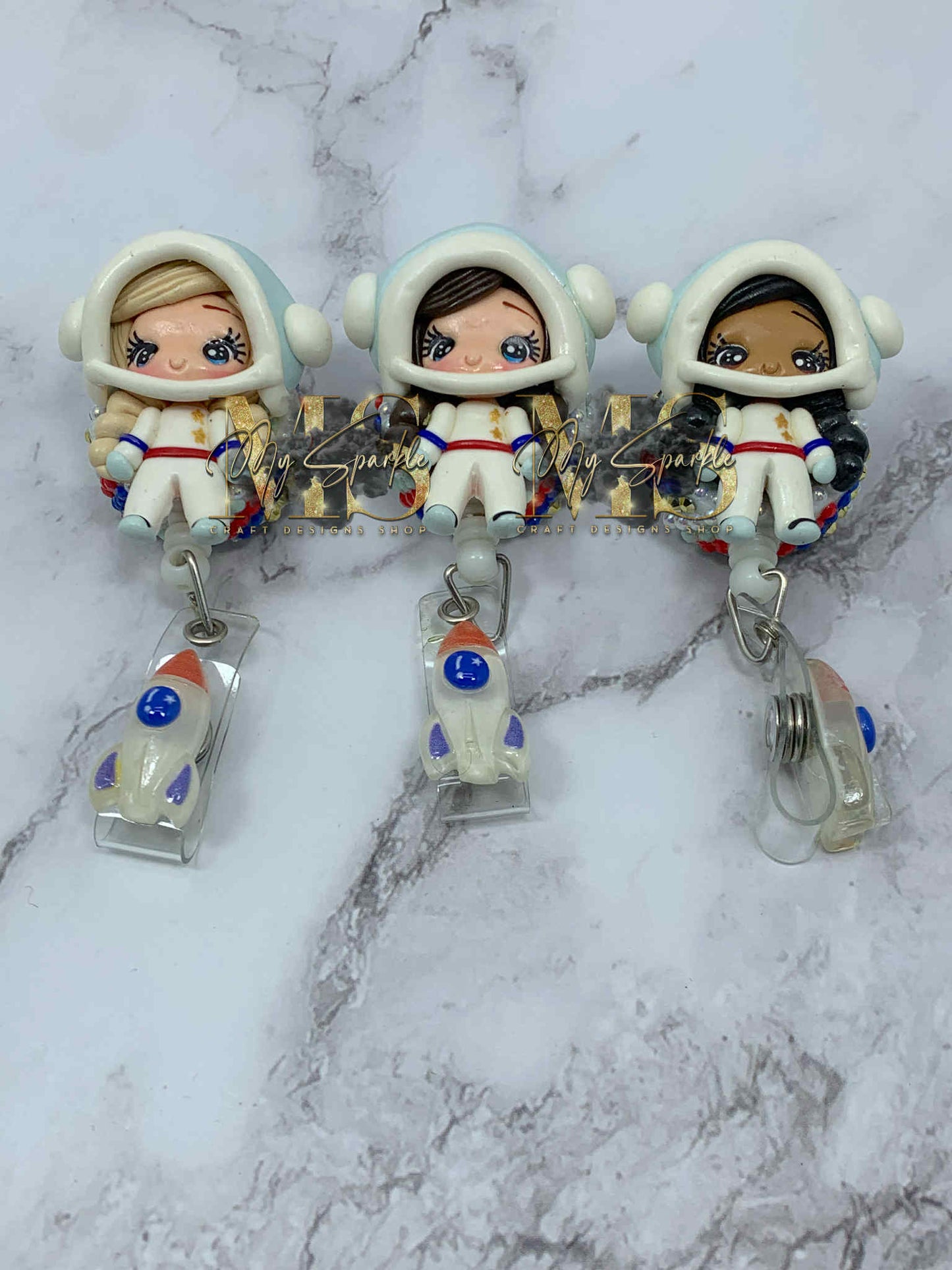 Astronaut Girl Clay Badge Reel