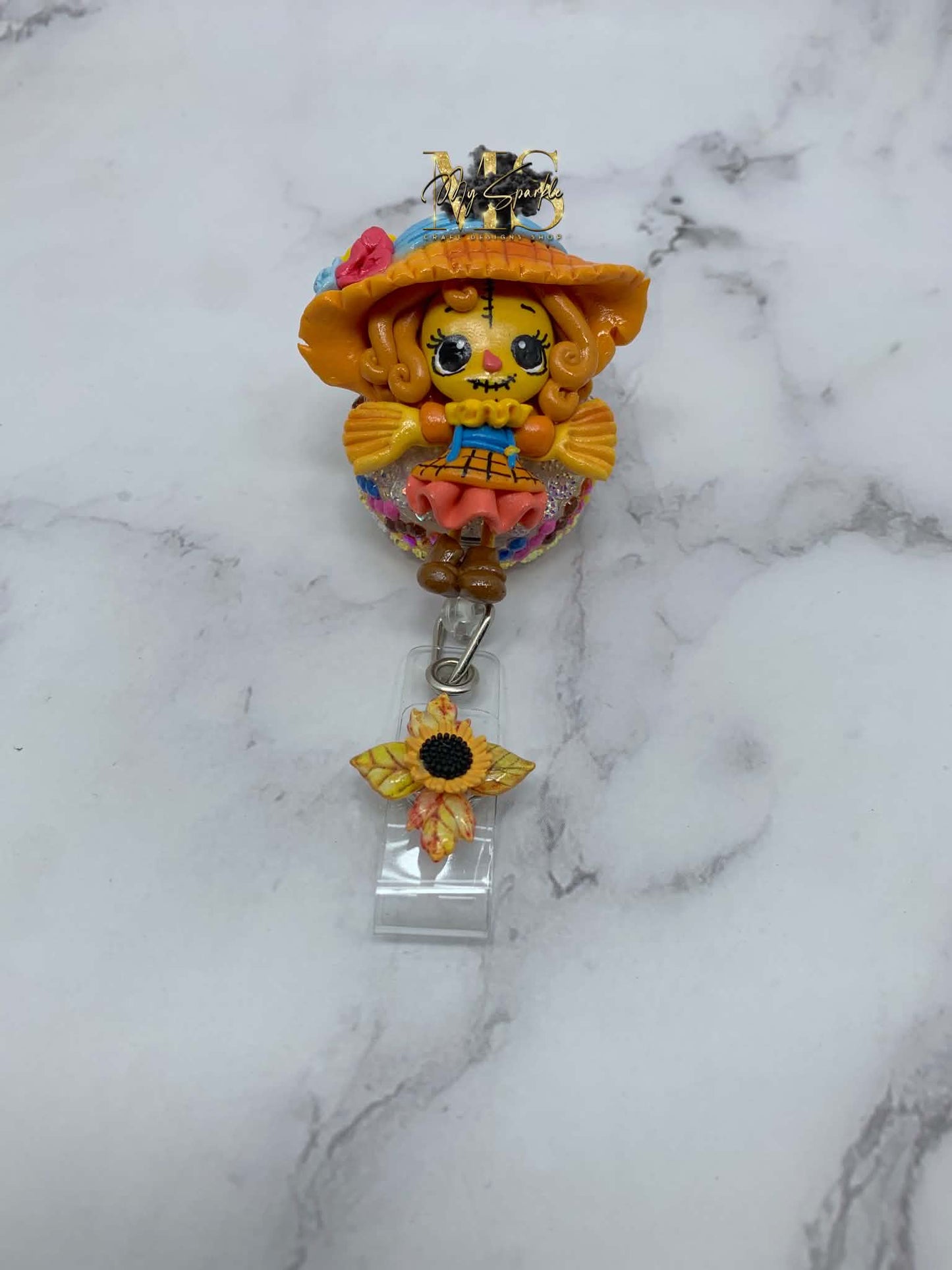 Scarecrow Girl Clay Badge Reel