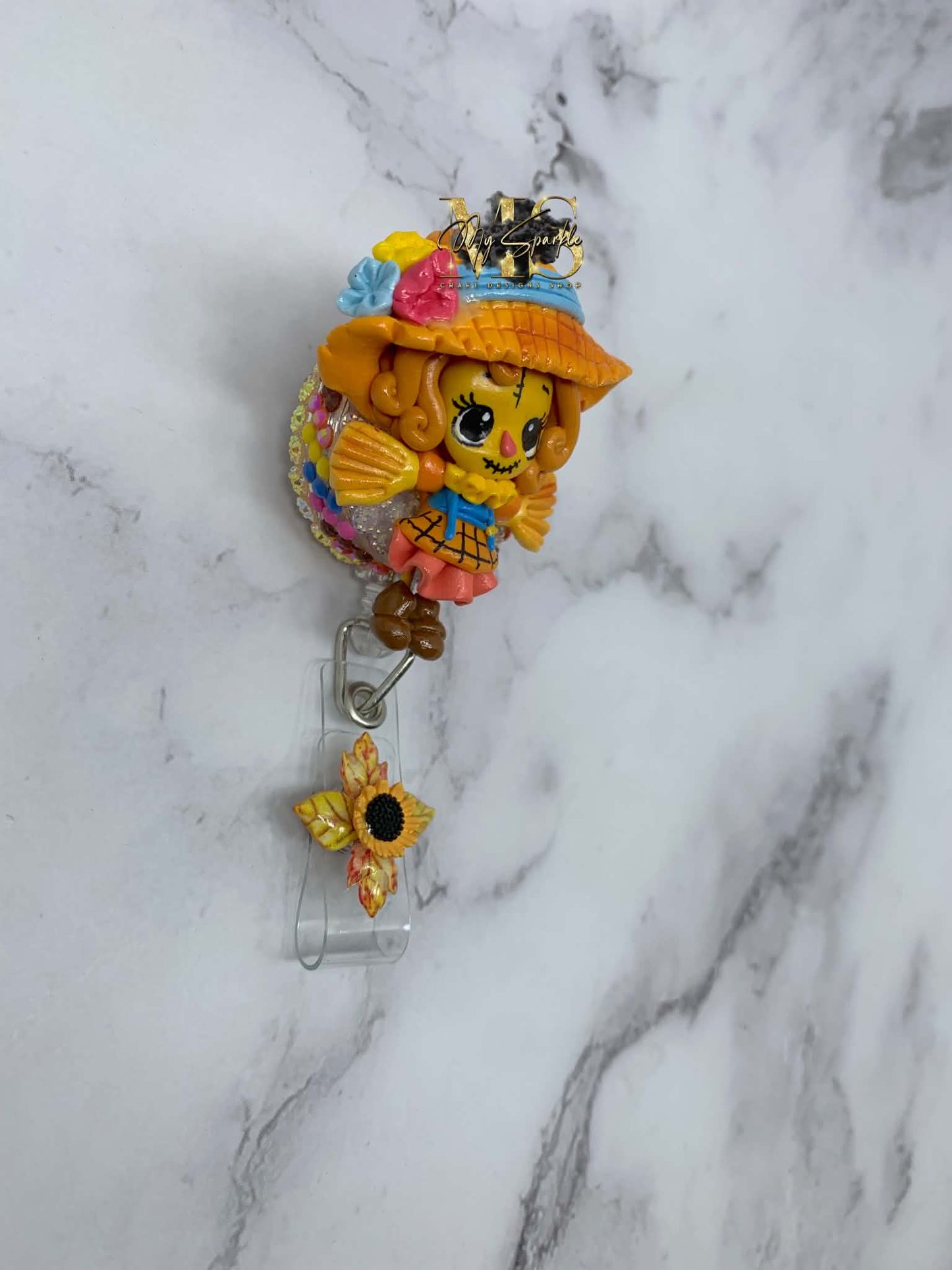 Scarecrow Girl Clay Badge Reel