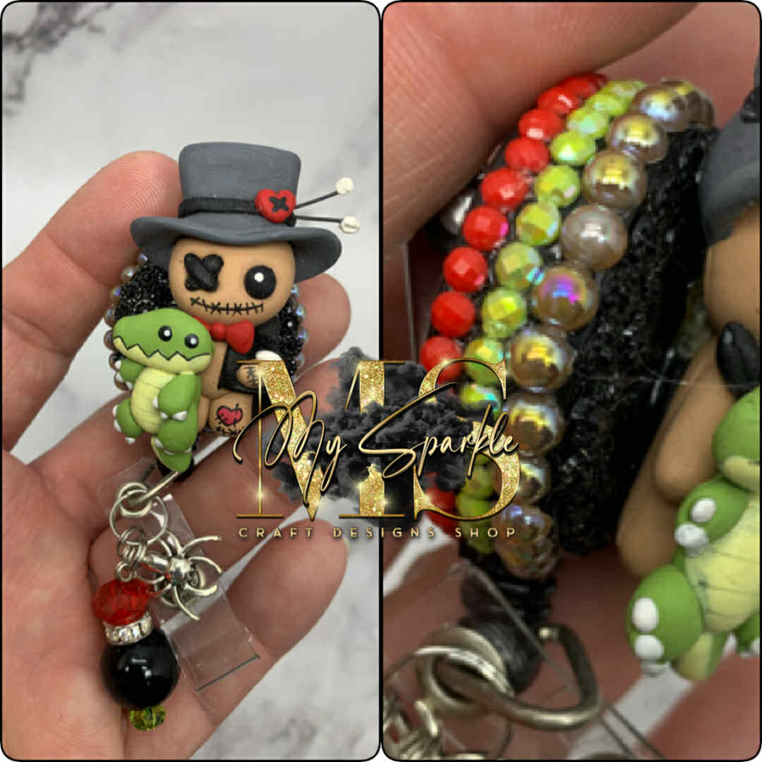 Voodoo Doctor Doll Clay Badge Reel