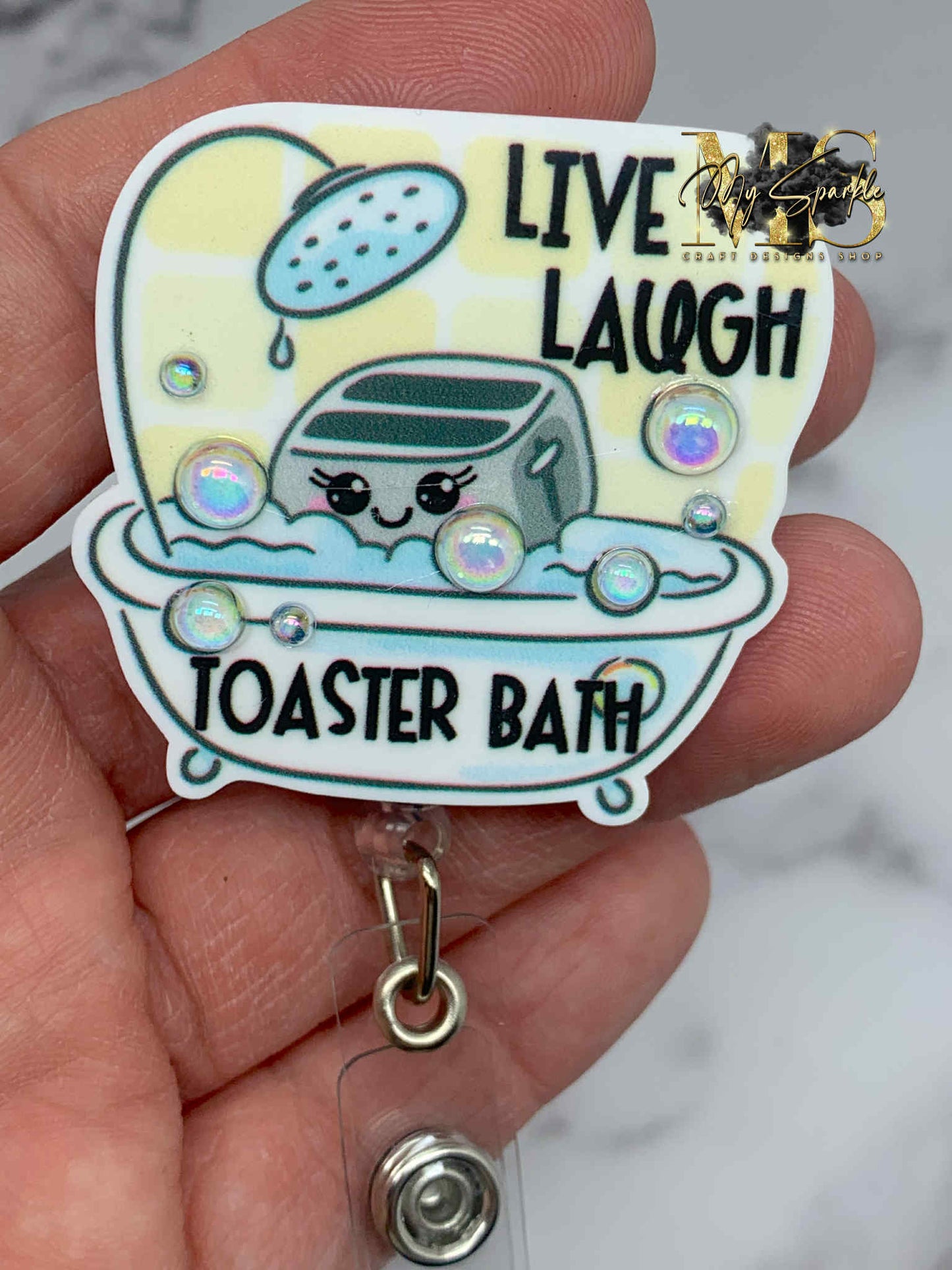 Live Laugh Toaster Bath Badge Reel