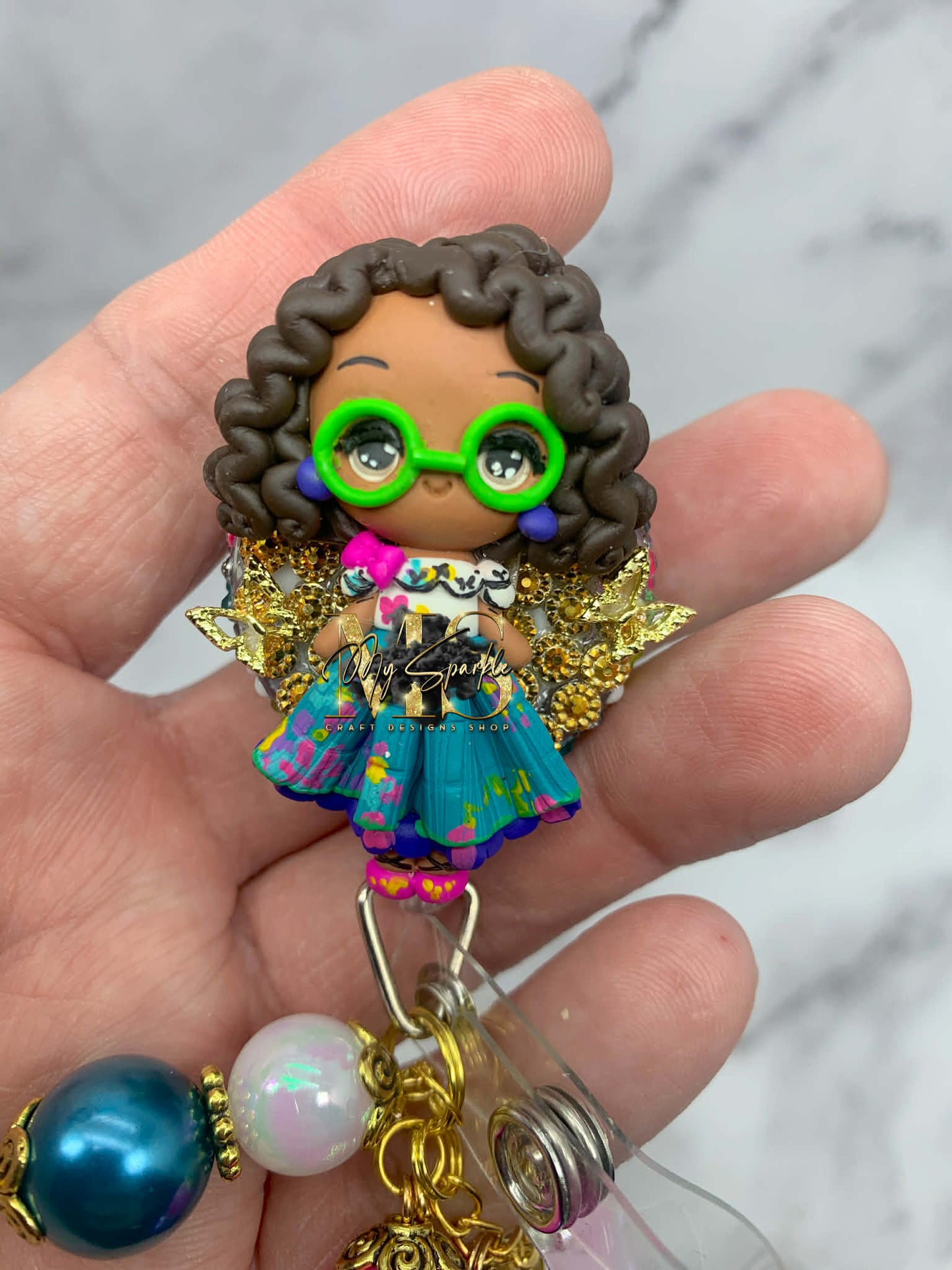 Colombian Girl Clay Badge Reel