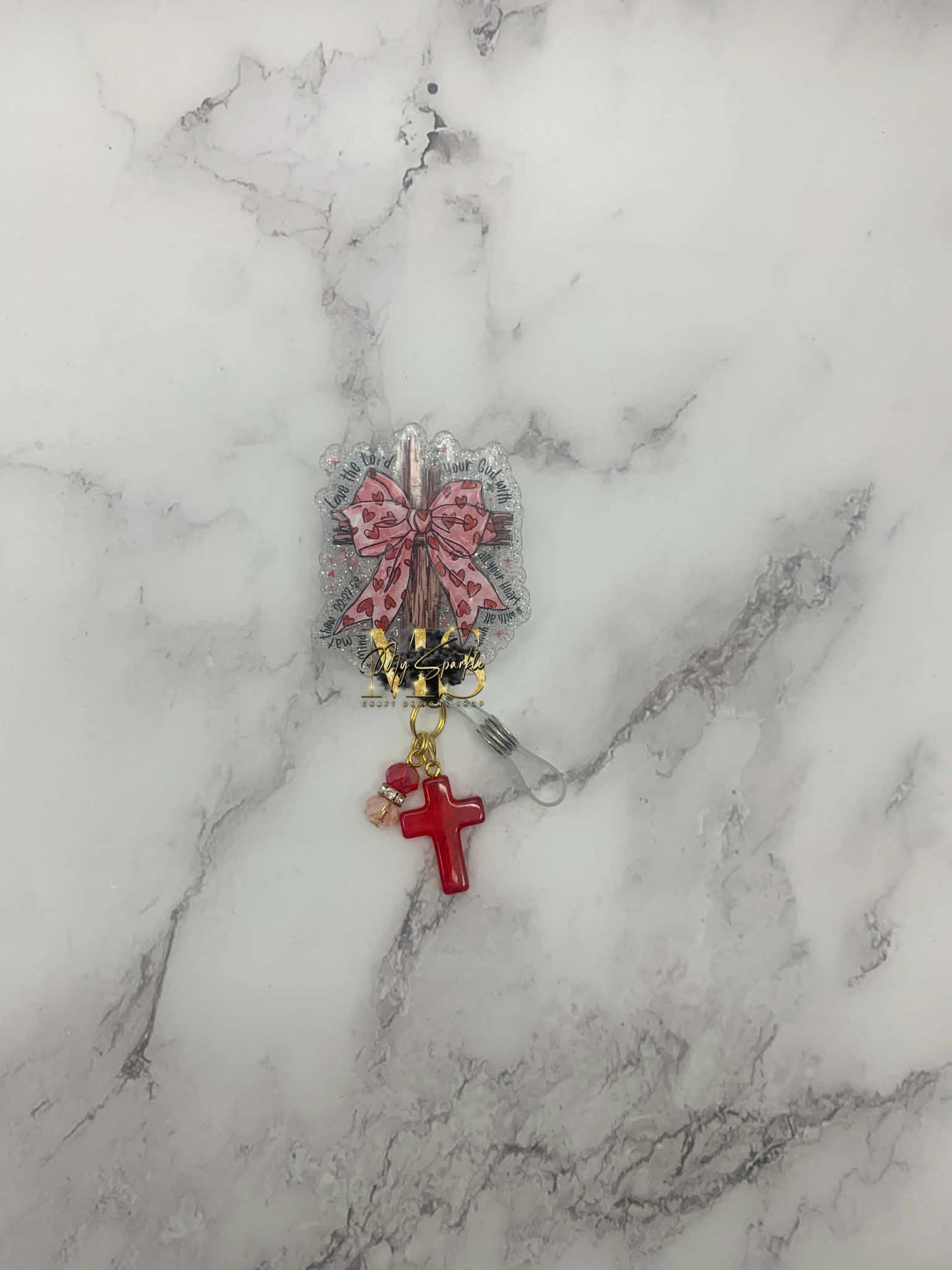 Coqutte Valentine Jesus Badge Reel