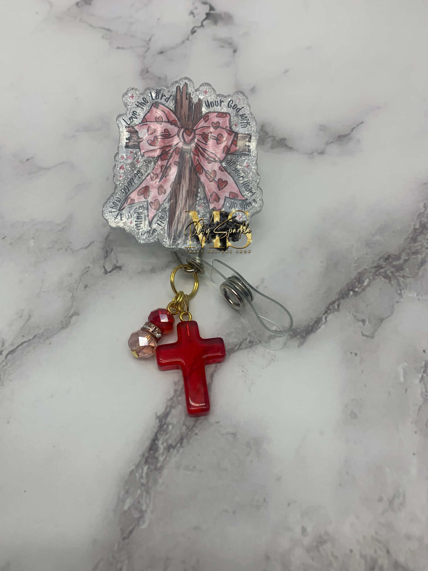 Coqutte Valentine Jesus Badge Reel