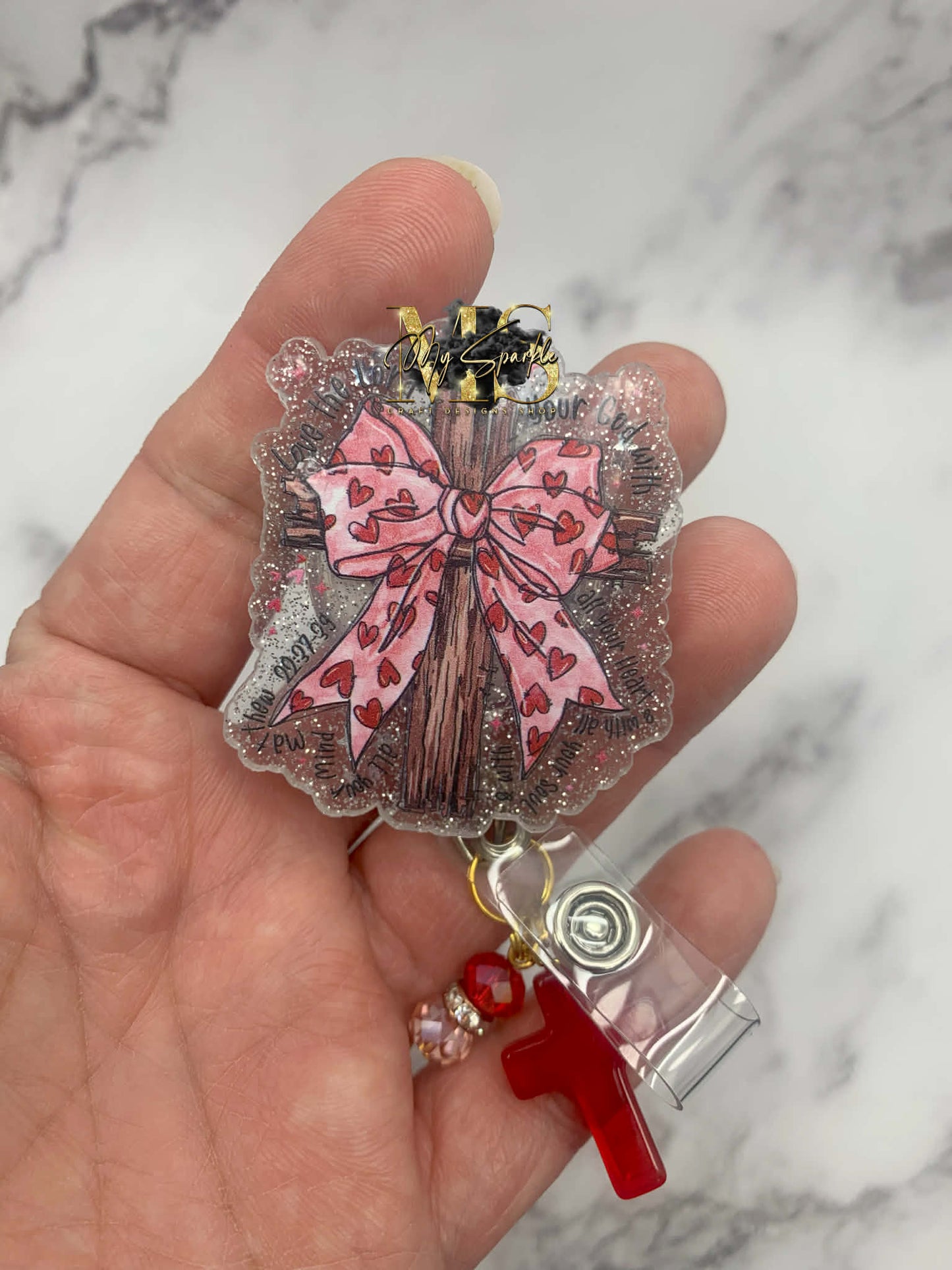 Coqutte Valentine Jesus Badge Reel