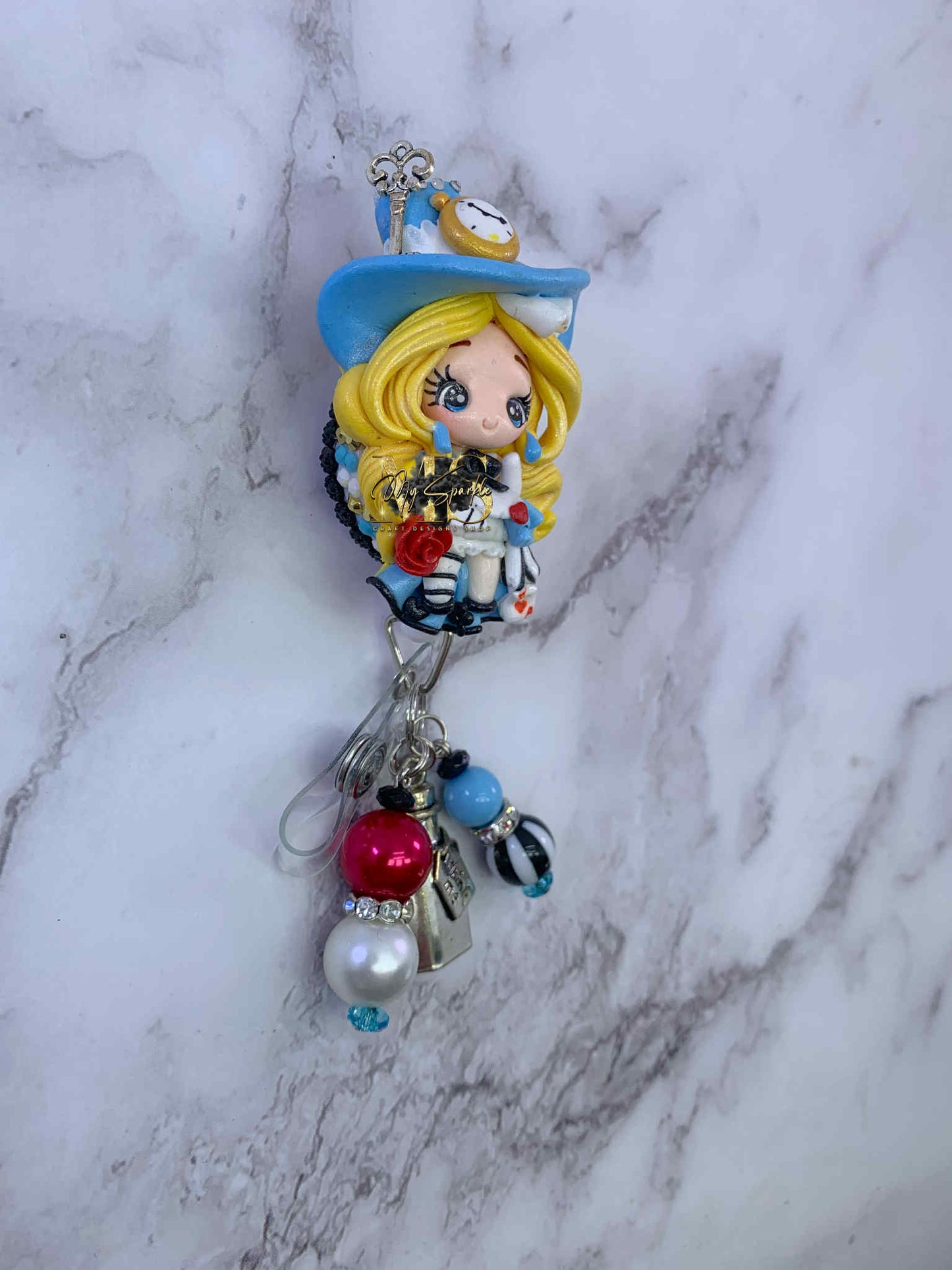 Girl Wonderland Clay Badge Reel