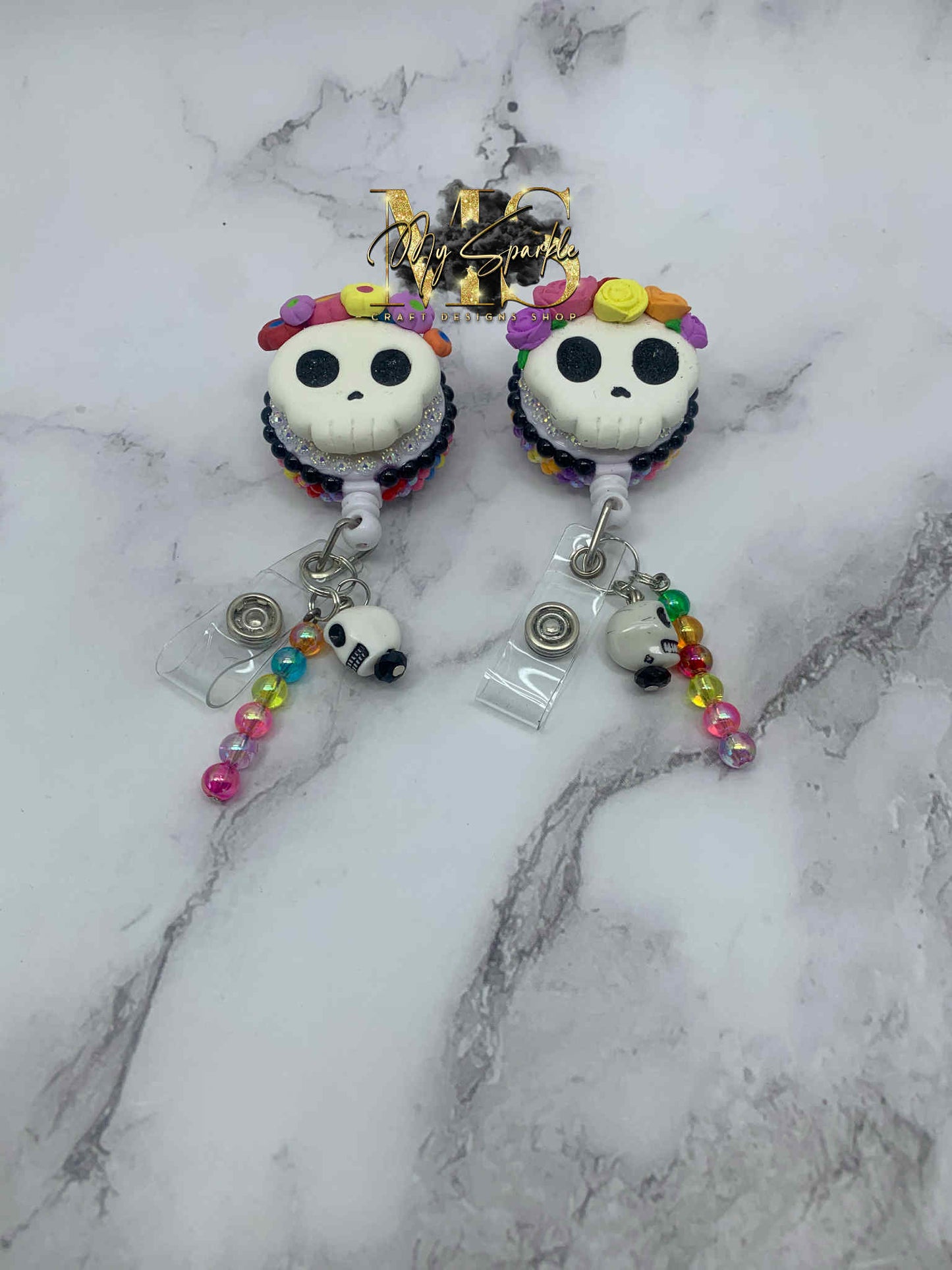 Sugar Skul Head Clay Badge Reel