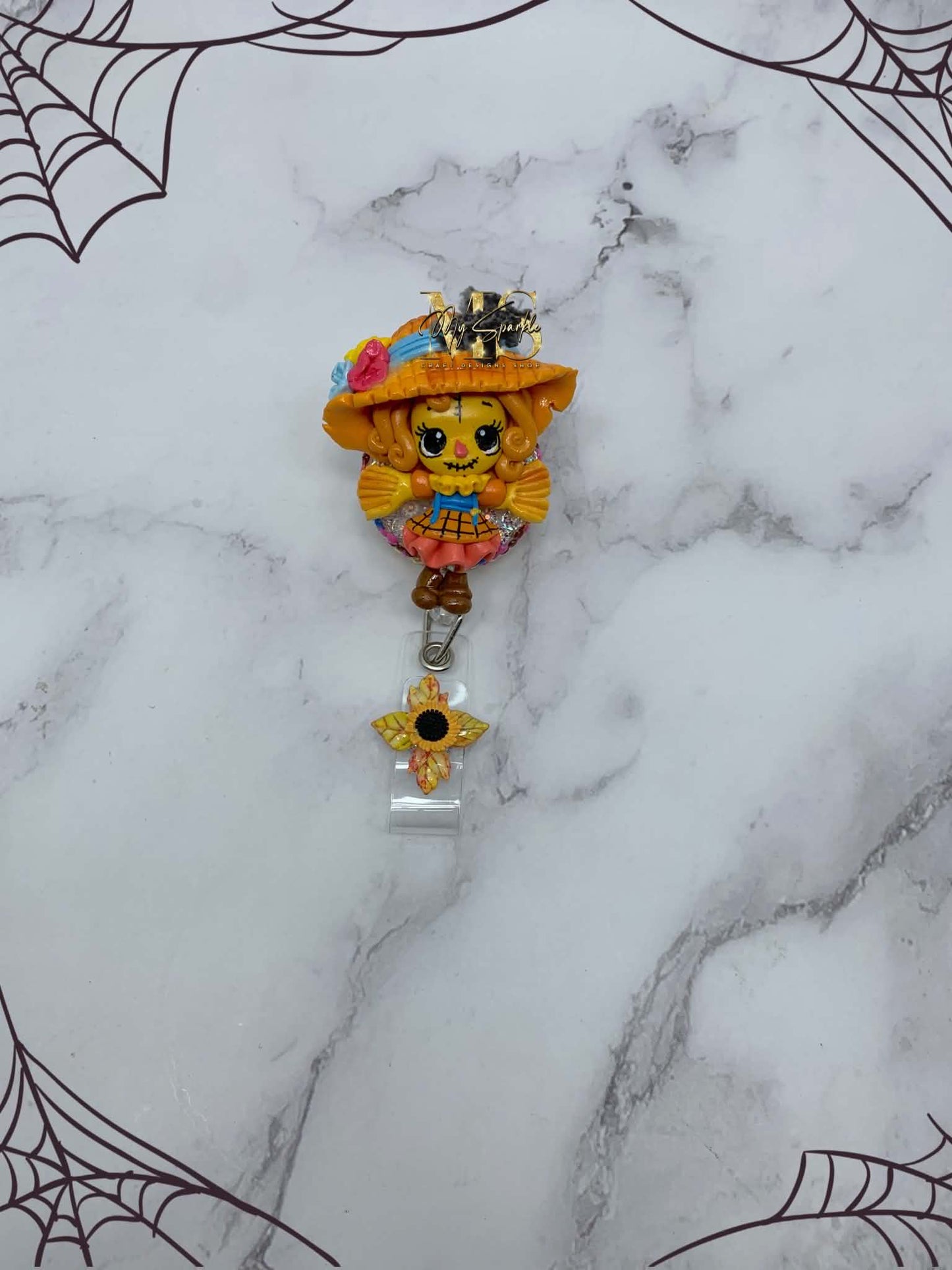 Scarecrow Girl Clay Badge Reel