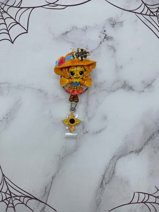 Scarecrow Girl Clay Badge Reel