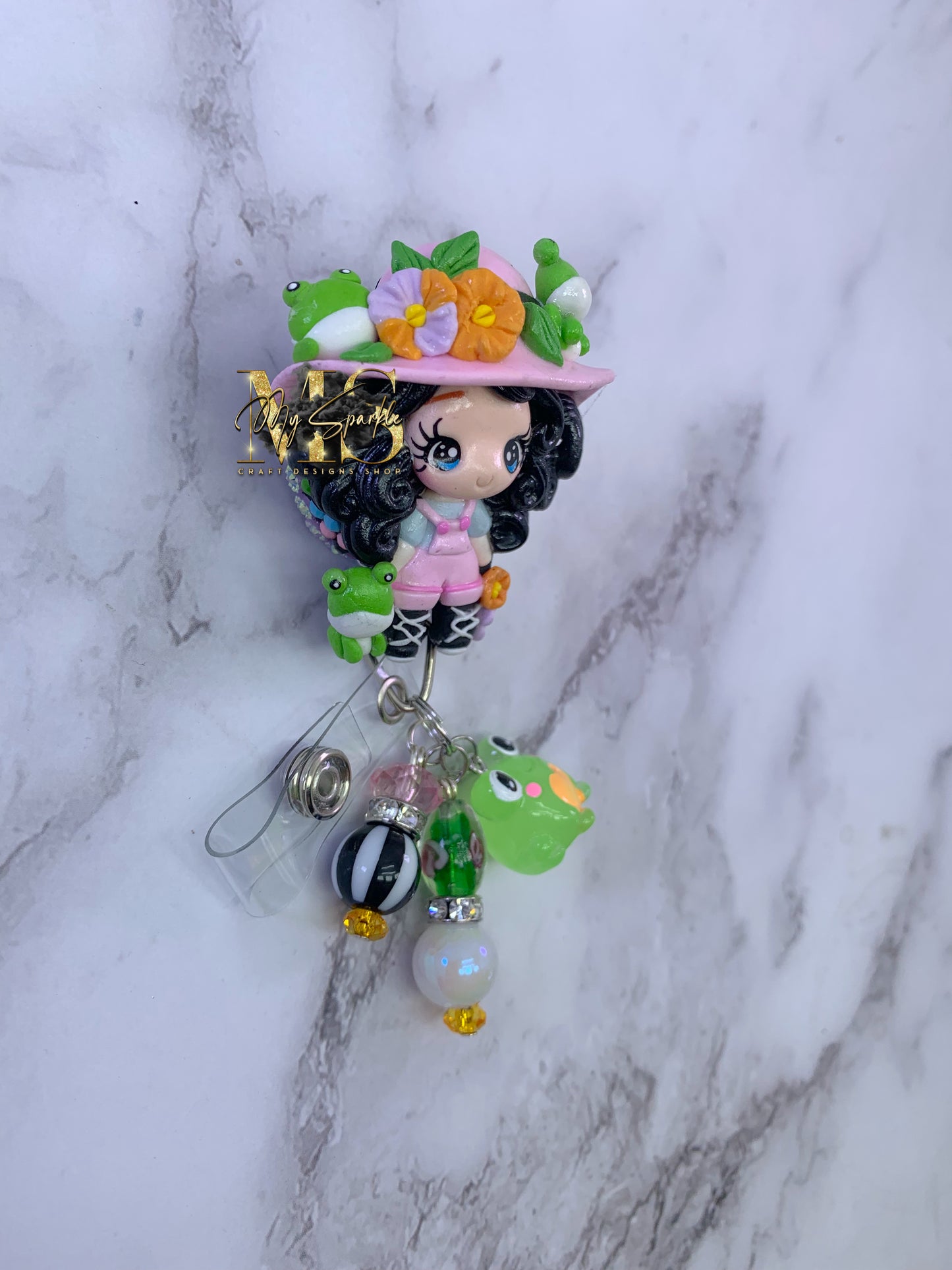 Cute Girl With Frogs Clay Badge Reel