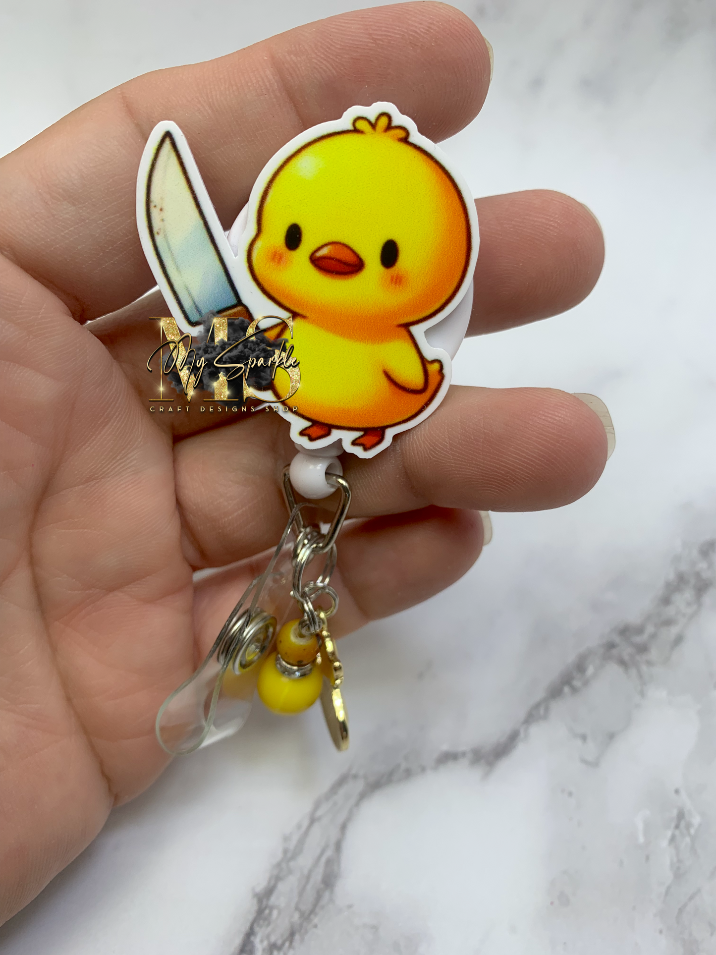 Funny Chick With Knife Badge Reel