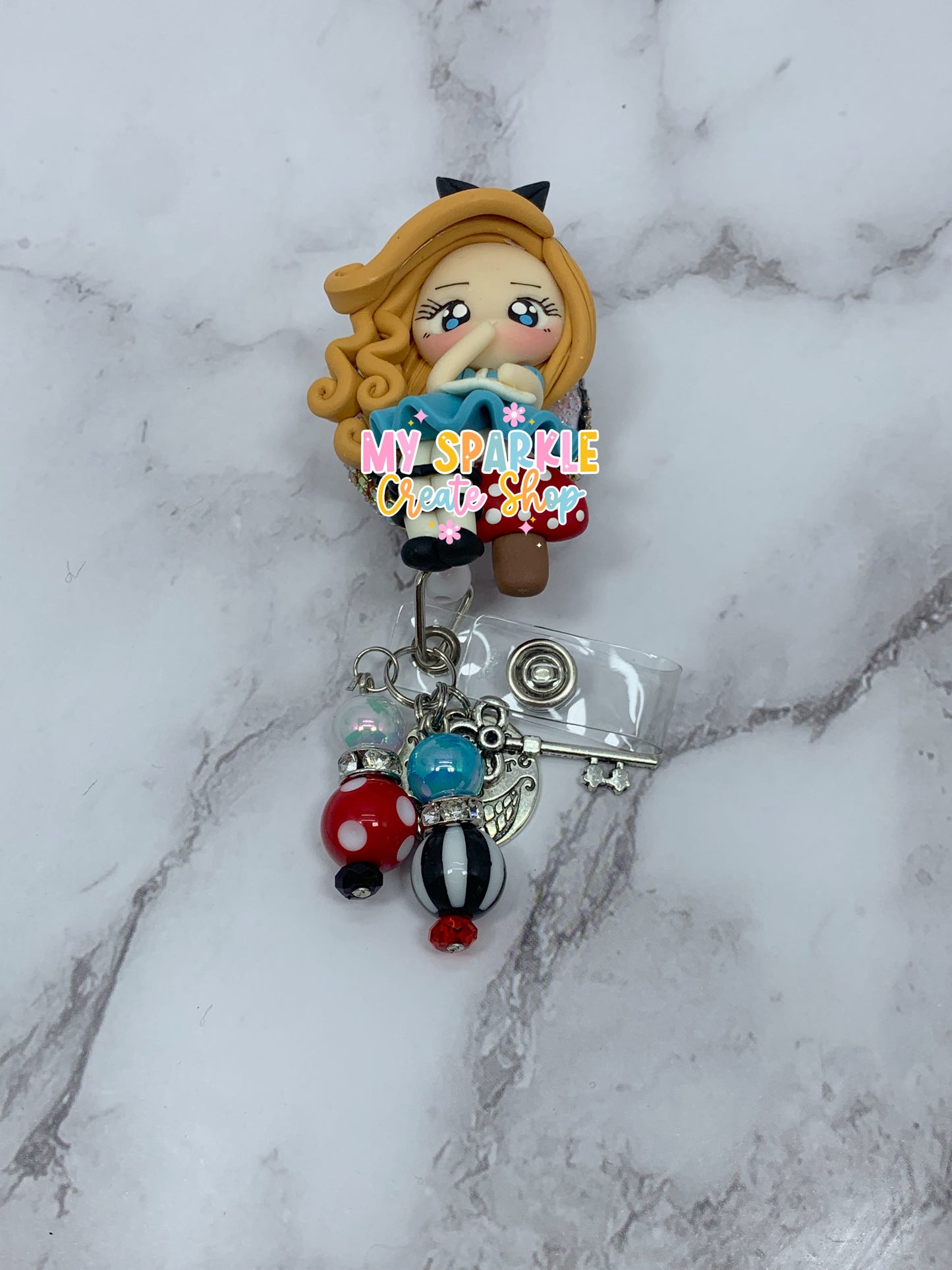 Girl Wonderland Clay Badge Reel
